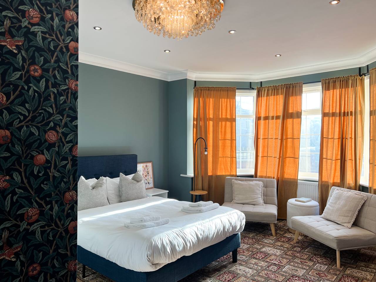 Bedroom with terracotta wall-mounted desk